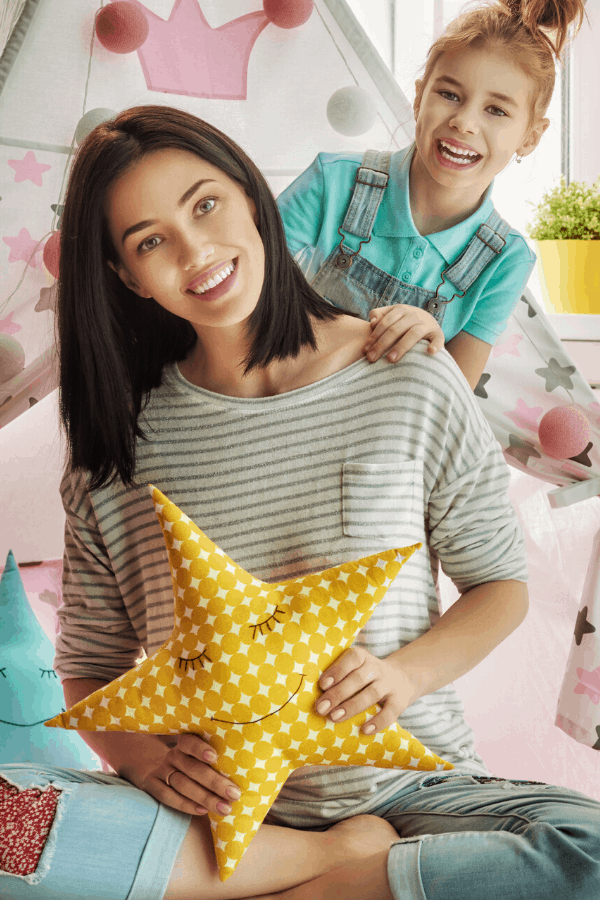 mom holding a stuffed star