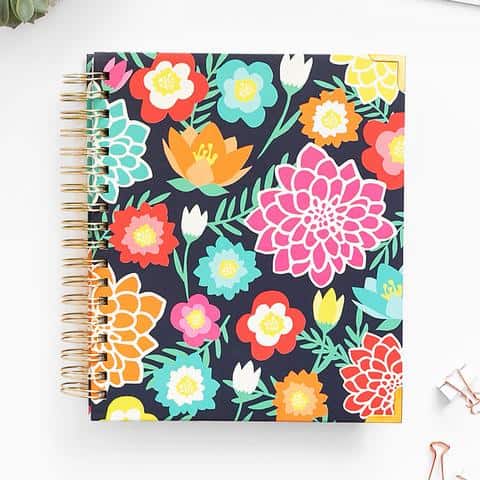 living well planner sitting on a desk