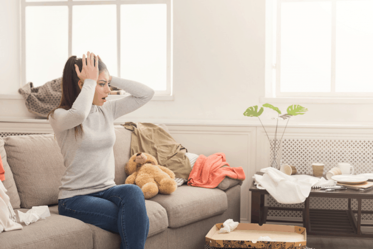 woman distressed by the clutter in her home