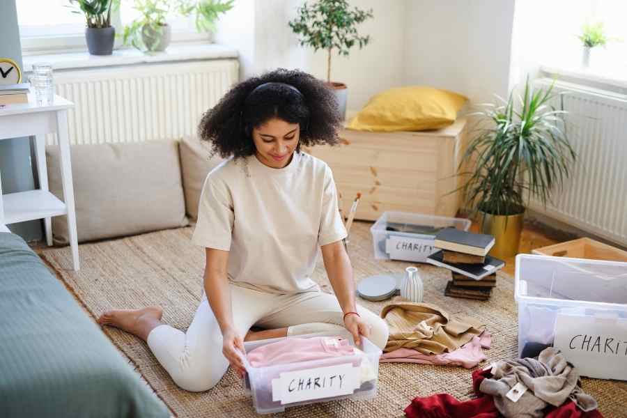 woman sorting through clutter