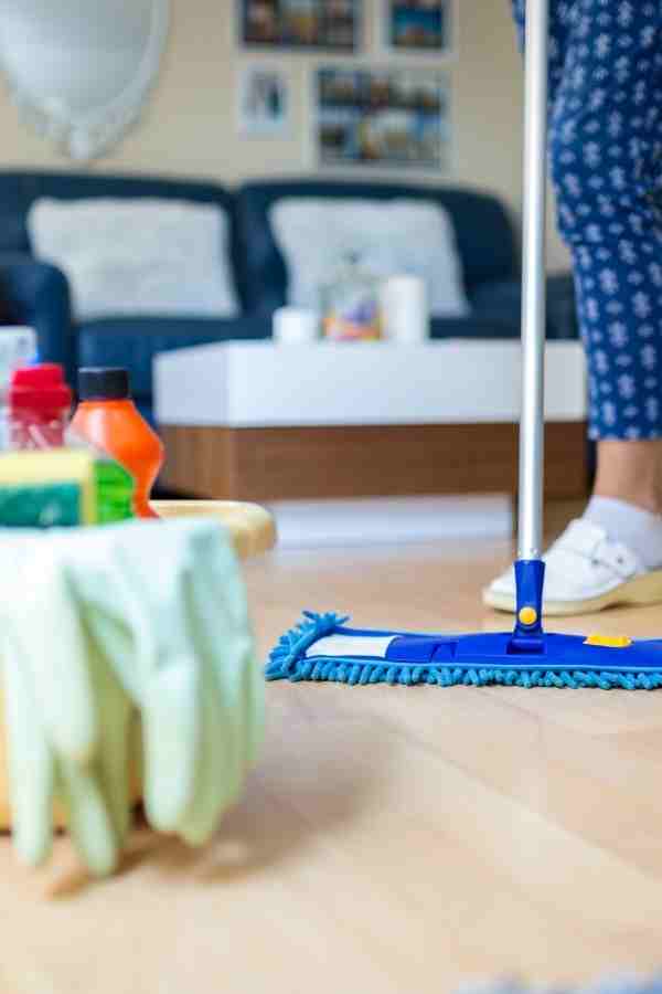 woman mopping the floor